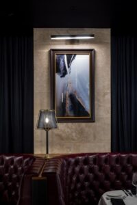 Del frisco's Double Eagle Steakhouse in Pittsburgh highlights the industrial history and iconic aspects of Pittsburgh through art and decor