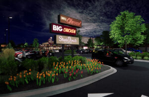 An illuminated sign shows the possible tennants of the restaurant complex in Rosemont: Stan's Donuts, Big Chicken, and Small Cheval