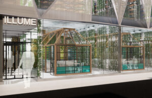 An exterior rendering of ILLUME, showing vertical gardens and private dining behind the transparent facade
