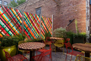 The vibrant outdoor patio at Nando's West Loop location in Chicago, IL