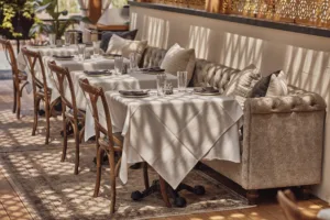 Long banquette seating offers plush, comfortable atmosphere in BLVD's atrium